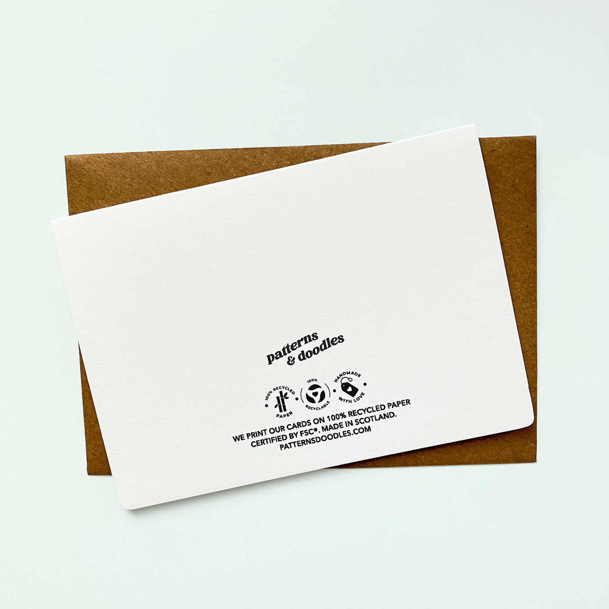 White card with 'Patterns & Doodles' branding on a recycled Kraft brown envelope.